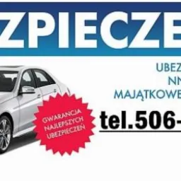 Reklama ubezpieczeń: biały Mercedes klasy E na białym tle z niebieskim napisem 'UBEZPIECZENIA', czerwona gwiazda z napisem 'Gwarancja najlepszych ubezpieczeń' oraz numer telefonu.
