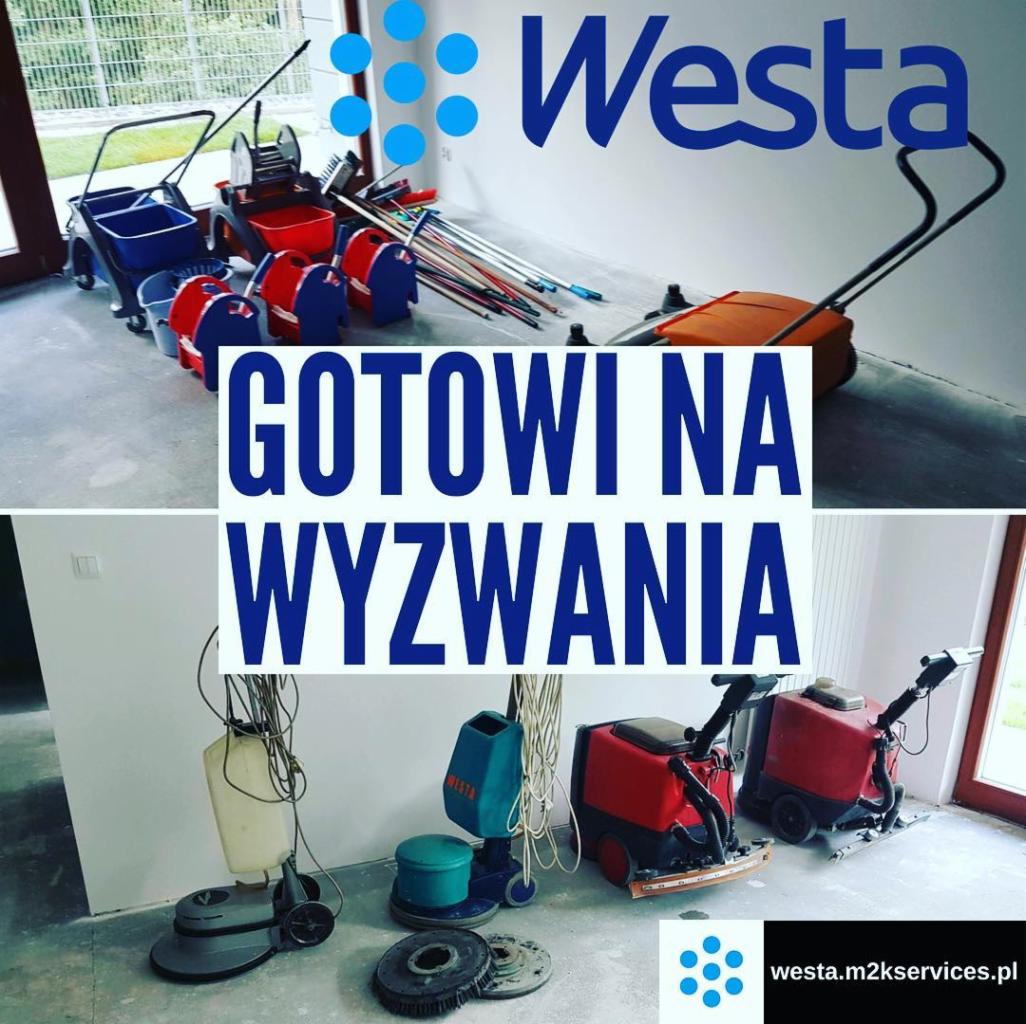 Kompozycja sprzętu do czyszczenia podłóg, w tym szorowarek, mopów, wiader i środków czystości, z napisem 'GOTOWI NA WYZWANIA' i logo firmy Westa.