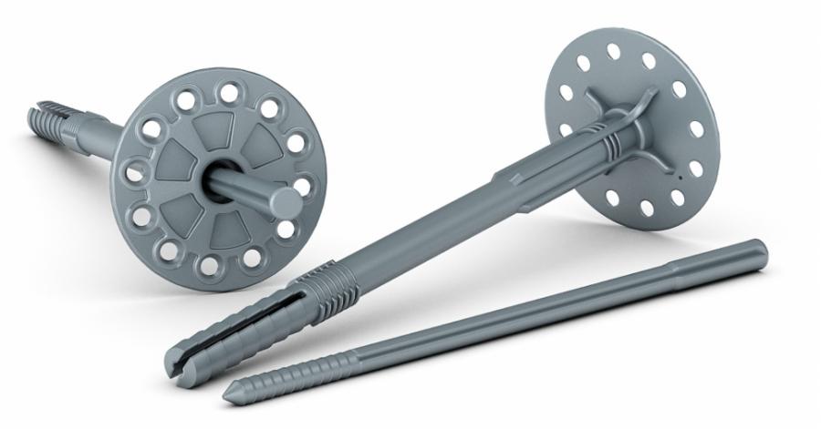 Szare łączniki do mocowania izolacji termicznej z plastikowym trzpieniem i dużą okrągłą podkładką z otworami, leżące na białym tle.