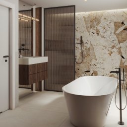 AP STUDIO AGATA POZOWSKA-MAJCHRZAK - Nowoczesna łazienka z wolnostojącą wanną, umywalką na szafce z drewna i ścianą z marmuru. Minimalistyczny design, eleganckie wykończenie, oświetlenie LED.