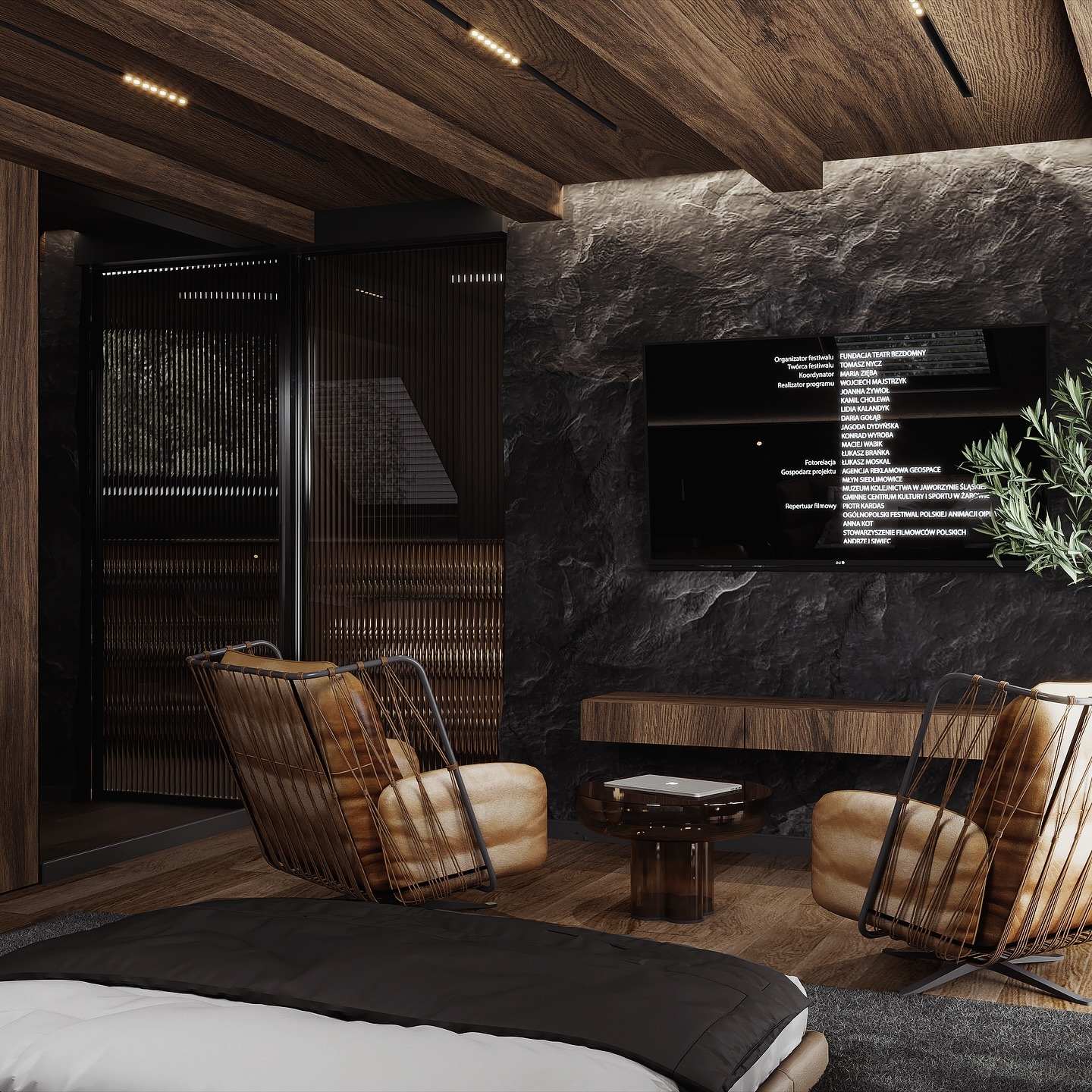 Nowoczesna sypialnia z kamienną ścianą, drewnianym sufitem i designerskimi fotelami. Telewizor wkomponowany w ścianę. Minimalistyczny stolik kawowy.