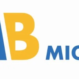 Logo firmy Migbud: niebieskie litery MB z żółtym kaskiem budowlanym na M, obok napis Migbud.