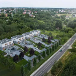 Wizualizacja czterech nowoczesnych domów jednorodzinnych dwulokalowych z płaskimi dachami i podziemnymi garażami, otoczonych zielenią, widok z lotu ptaka.