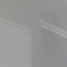 Wykończony narożnik sufitu z listwą dekoracyjną, pomalowany na biało, widoczne łączenie ściany z sufitem.