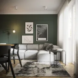 Wizualizacja salonu z zielonymi ścianami, szarą sofą narożną, drewnianą podłogą w jodełkę i abstrakcyjnymi plakatami na ścianie.