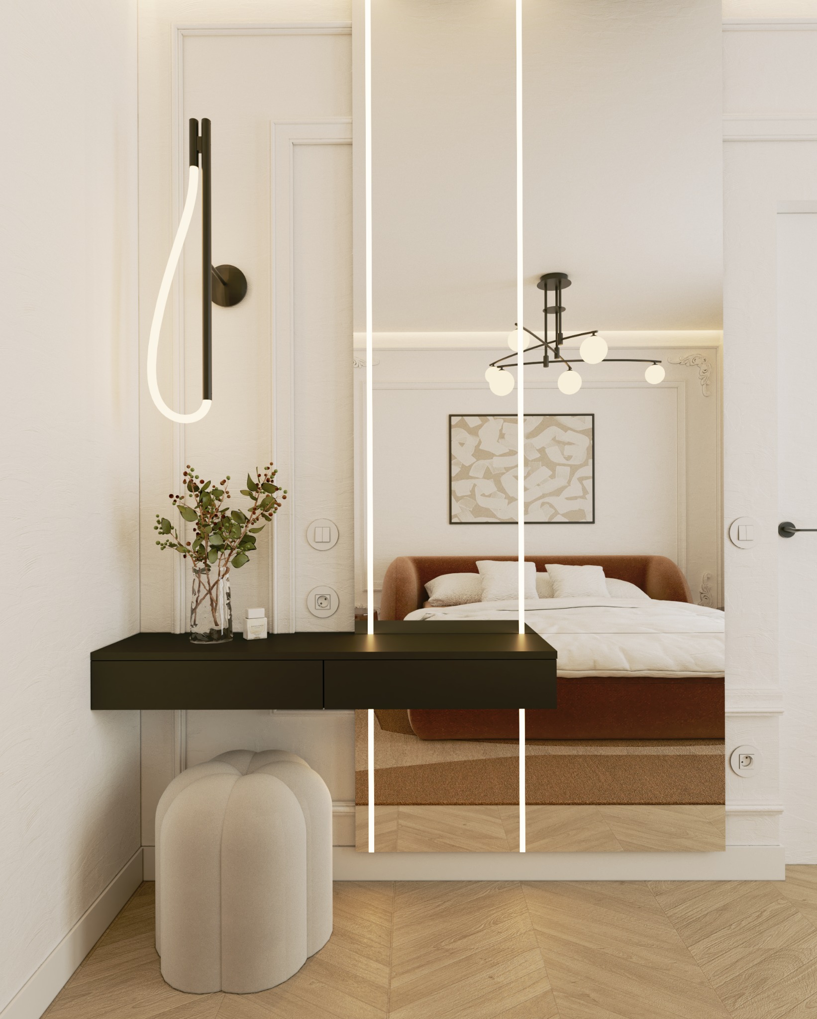 Nowoczesna toaletka z czarnym blatem i pufą w sypialni, odbicie łóżka i lampy w lustrze z podświetleniem LED.