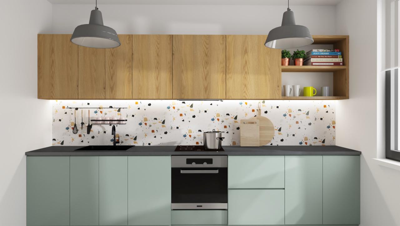 Nowoczesna kuchnia z miętowo-zielonymi szafkami dolnymi i drewnianymi górnymi, podświetlony blat z wzorem lastryko, wiszące lampy w stylu industrialnym, czarny zlew i płyta indukcyjna, srebrny...