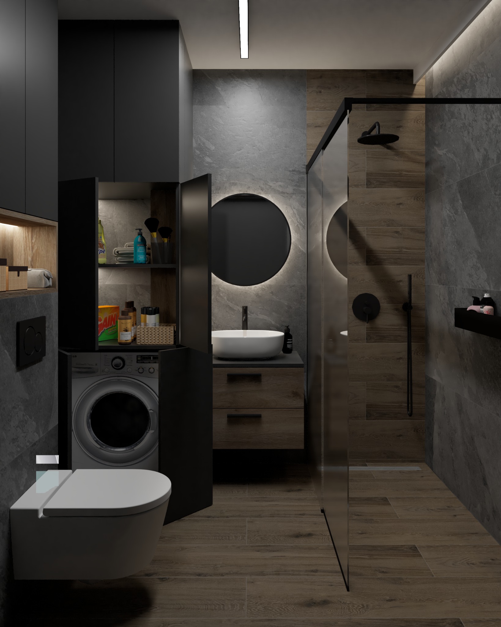 Nowoczesna łazienka w ciemnych odcieniach szarości i brązu z podświetlanym okrągłym lustrem, kabiną prysznicową typu walk-in i pralką ukrytą w zabudowie szafkowej.