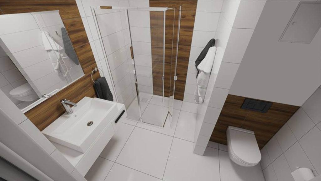 Wizualizacja małej łazienki z kabiną prysznicową, umywalką nablatową i toaletą, wykończonej białymi płytkami i panelami drewnopodobnymi.