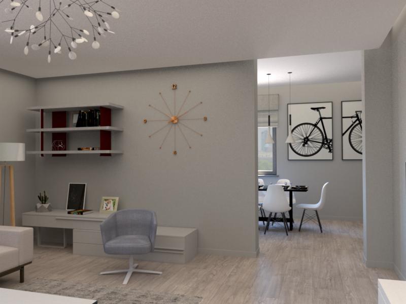 Nowoczesny salon z szarą kolorystyką, okrągłym zegarem na ścianie, minimalistycznymi półkami, biurkiem, krzesłem obrotowym i widokiem na jadalnię z grafikami rowerów.