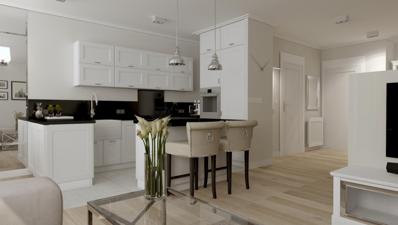 Nowoczesna kuchnia w bieli i czerni, z wyspą i dwoma krzesłami barowymi z beżową tapicerką oraz szklanym stolikiem kawowym z kwiatami w wazonie na pierwszym planie, oświetlona dwoma wiszącymi lampami.