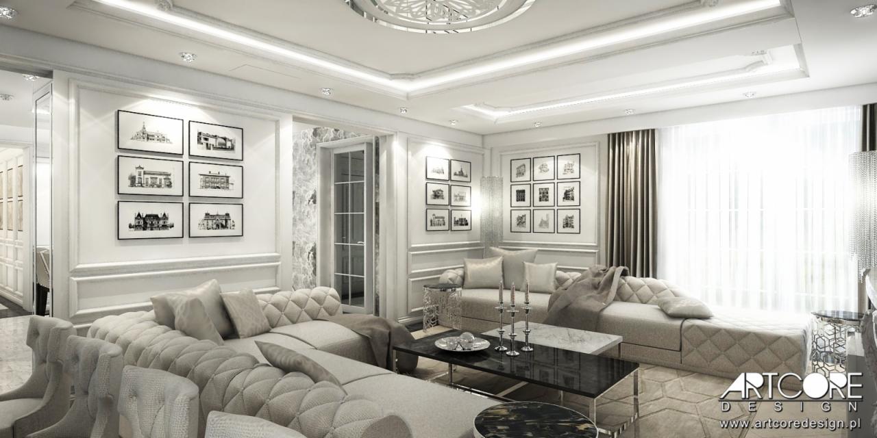 Elegancki salon w odcieniach bieli i beżu, z pikowanymi sofami, czarnymi stolikami kawowymi i galerią czarno-białych grafik na ścianach.