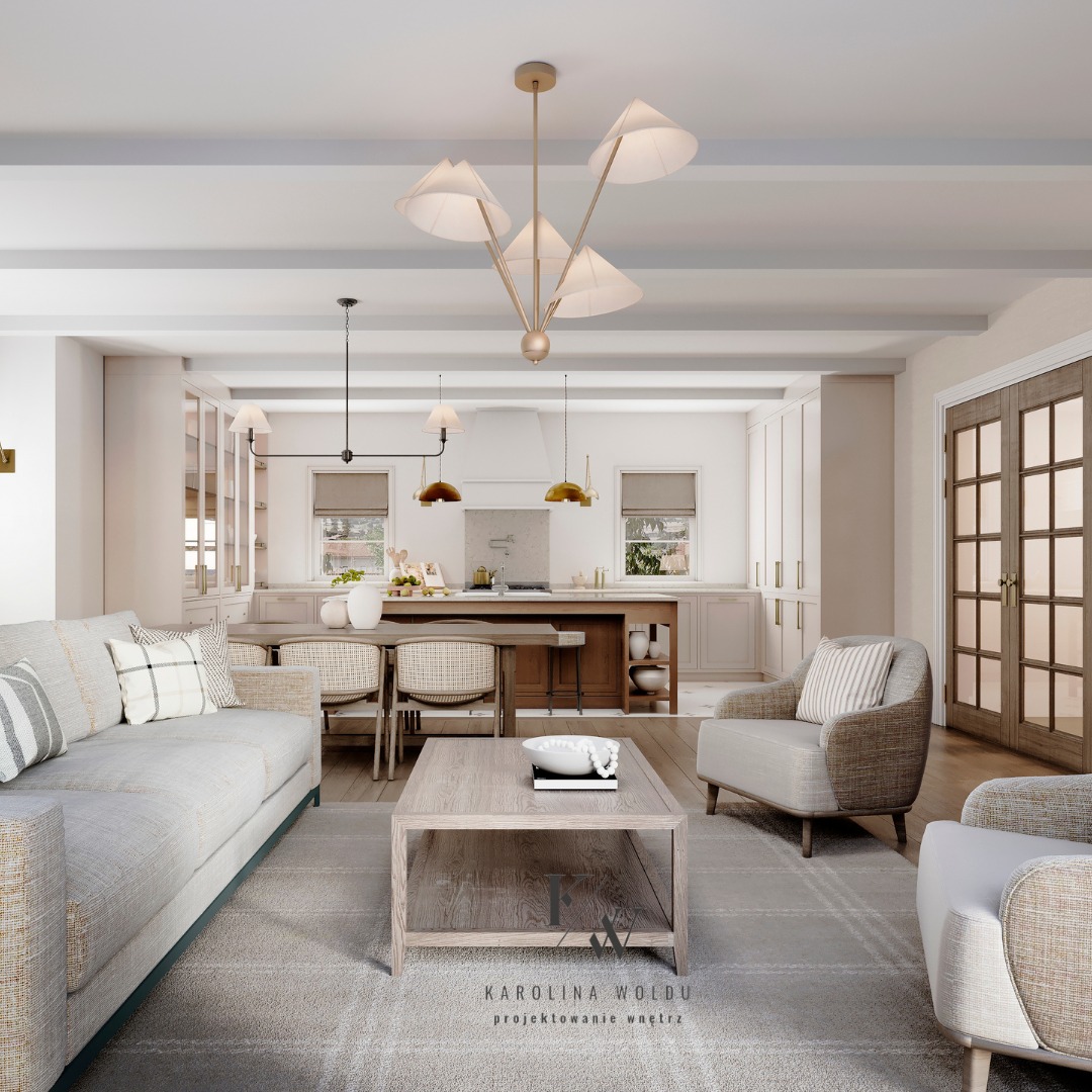 Jasne, przestronne wnętrze domu z otwartą kuchnią i salonem, neutralna kolorystyka, drewniane akcenty, designerska lampa wisząca, sofa z poduszkami w paski i geometryczne wzory, drewniany stół...