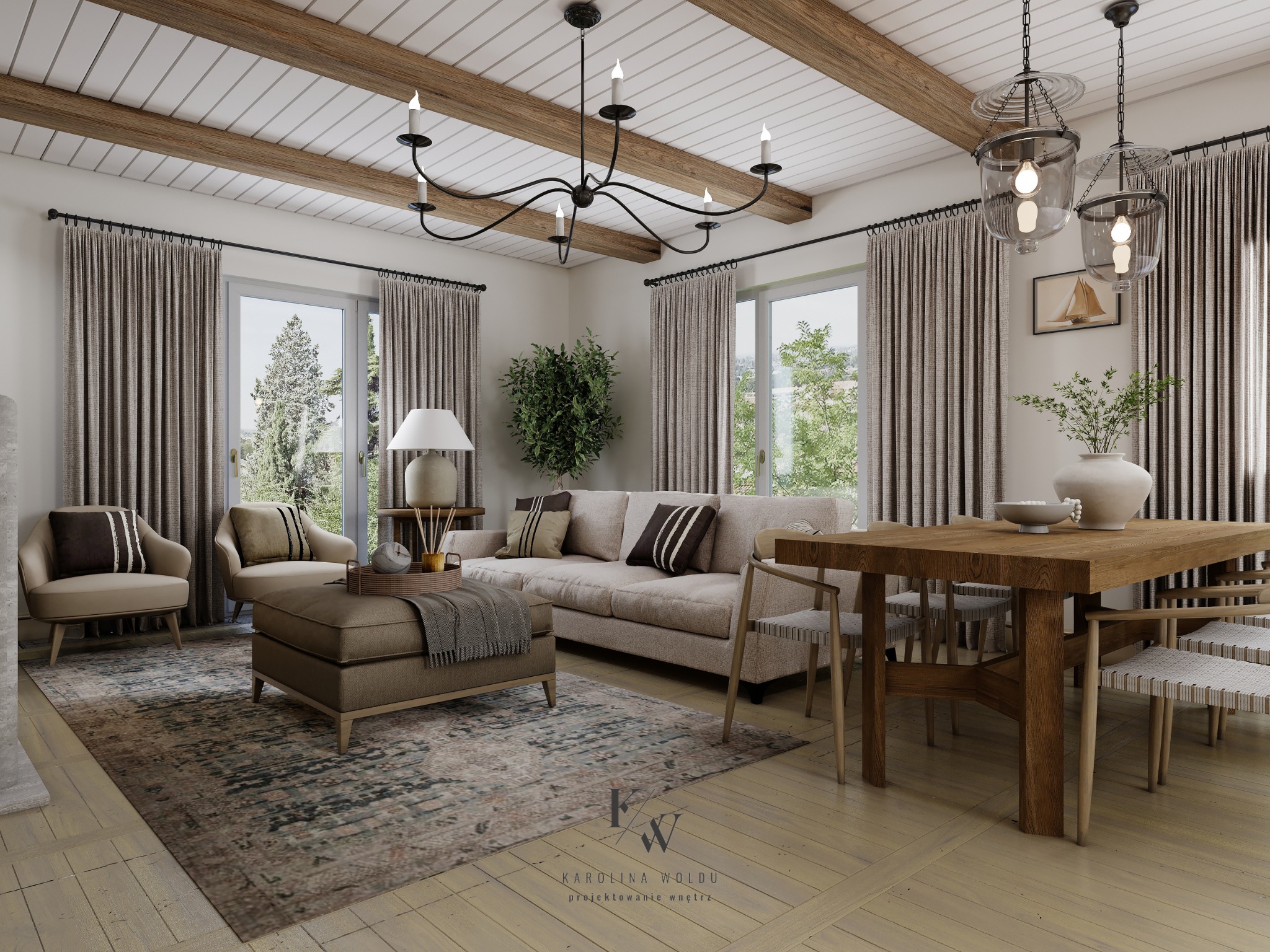 Jasne wnętrze salonu z drewnianym stołem, beżową sofą, dwoma fotelami i pufą na wzorzystym dywanie, oświetlone wiszącymi lampami i naturalnym światłem z okien.