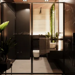 Nowoczesna łazienka z kabiną prysznicową typu walk-in, czarnymi marmurowymi płytkami, umywalką nablatową i pionową ścianą z roślin. Na ścianie widoczny minimalistyczny kran. Całość doświetlona...