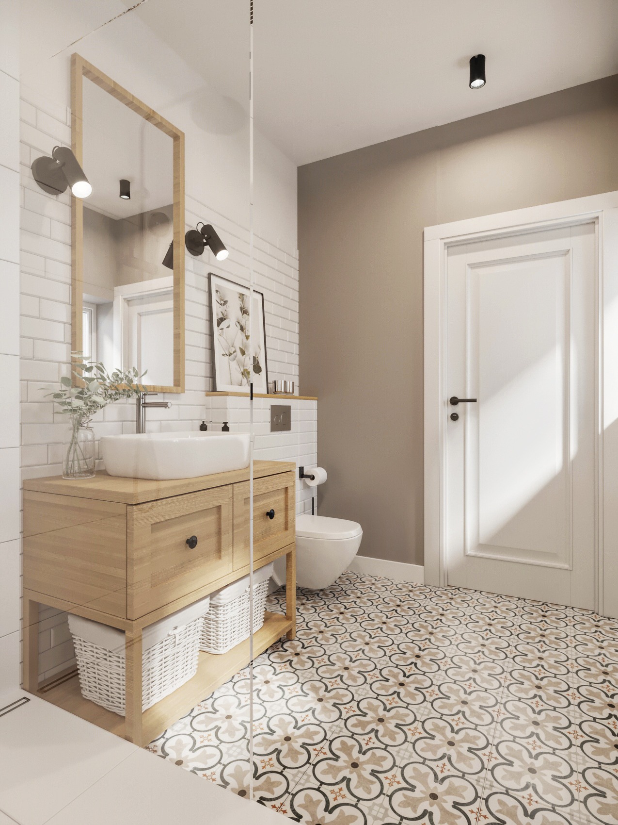 Jasna łazienka z drewnianą szafką pod umywalką, białymi koszami wiklinowymi, wzorzystą podłogą i białymi płytkami na ścianach.