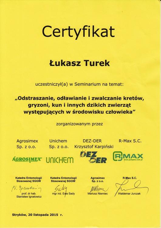 Żółty certyfikat ukończenia seminarium przez Łukasza Turka, dotyczącego odstraszania i zwalczania szkodników, z logotypami firm organizujących.