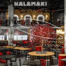 Wnętrze restauracji HALA MAKI w Krakowie: widok ogólny na przestrzeń z meblami wolnostojącymi, obudowami punktów sprzedaży, toaletami i dekoracjami ścian w industrialnym stylu, z przewagą czerni...
