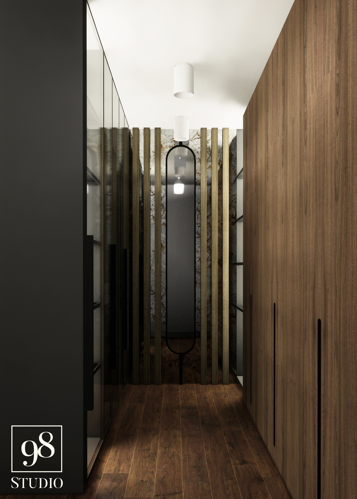 Wąski korytarz z drewnianą podłogą i panelami ściennymi, długie lustro w czarnej ramie, oświetlenie sufitowe, zabudowa szafy z forniru orzechowego.