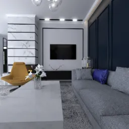 Wnętrze salonu z marmurowym kominkiem, ż&oacute;łtym fotelem obrotowym, szarą sofą z niebieską poduszką i białym stolikiem kawowym z kwiatami w wazonie.