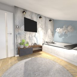 Decor Studiosanok - Nowoczesna sypialnia z łóżkiem na podeście, okrągłym dywanem i ścianą akcentową z telewizorem.