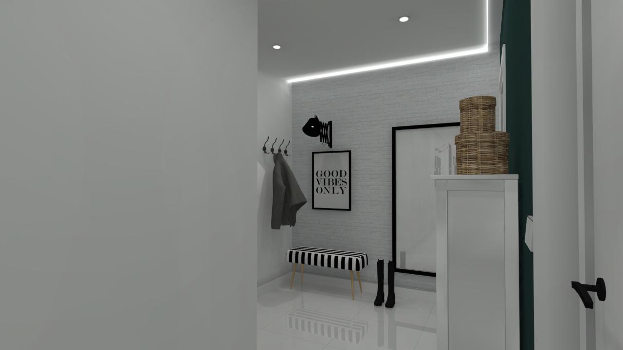 Wnętrze przedpokoju w minimalistycznym stylu z białymi ścianami, ceglaną fakturą, czarnymi akcentami w postaci wieszaka, lampy, grafiki z napisem 'Good Vibes Only', pufy w czarno-białe paski...