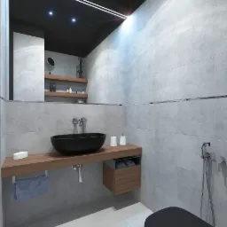 Nowoczesna łazienka z szarymi płytkami, czarną umywalką nablatową i toaletą, drewnianym blatem z p&oacute;łką na ręczniki i dekoracyjnymi p&oacute;łkami z akcesoriami widocznymi w lustrze.