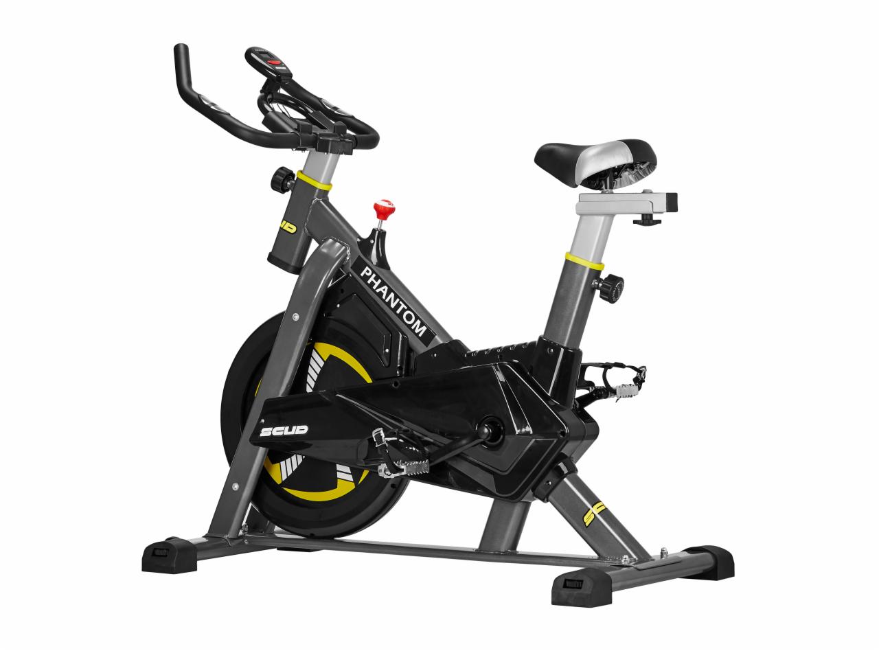 Szaro-czarny rower stacjonarny Phantom z żółtymi akcentami, widok z boku na białym tle.