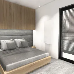 Wizualizacja sypialni z łóżkiem z szarym wezgłowiem, drewnianymi szafkami nocnymi i wiszącymi szafkami, oraz oknem z żaluzjami.