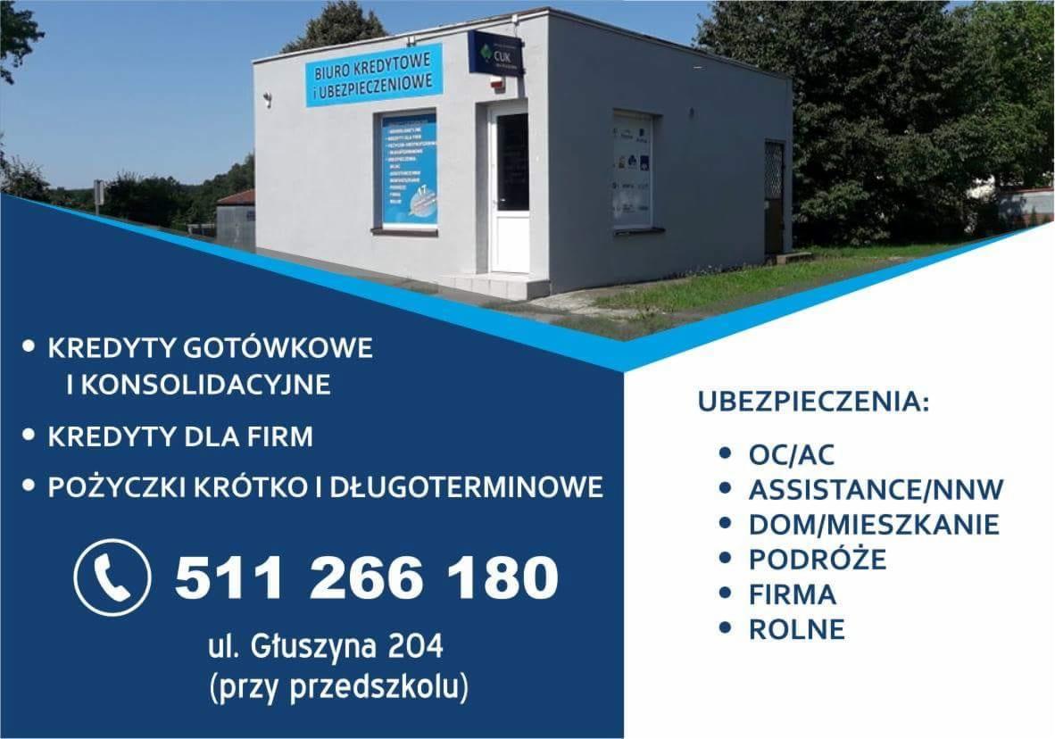 Budynek biura kredytowego i ubezpieczeniowego CUK z widocznym szyldem, numerem telefonu i ofertą kredytów gotówkowych oraz ubezpieczeń OC/AC, domów, podróży, firm i rolnych, zlokalizowanego przy...