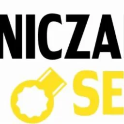 Logo firmy serwisowej z czarnym napisem OLEJNICZAK i żółtym SERWIS, ozdobione grafikami żółtych kluczy francuskich