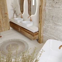 KRZYSZTOF BIELIK ARTCADE - STUDIO PROJEKTOWANIA WNĘTRZ - Nowoczesna łazienka w stylu rustykalnym z drewnianymi elementami, podwójną umywalką i owalnym lustrem z oświetleniem LED. Widoczna wanna i okrągły dywan.