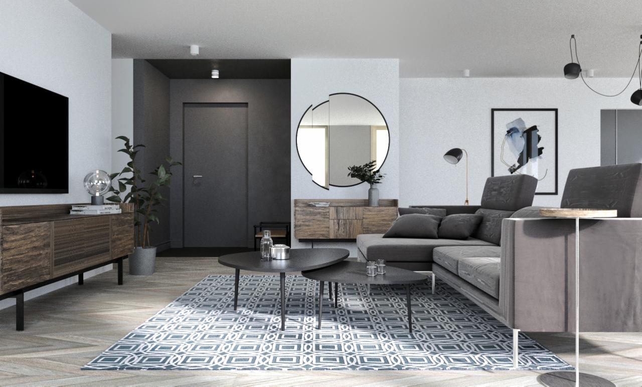Nowoczesny salon w Szczecinie z szarą sofą narożną, okrągłym lustrem nad drewnianą komodą, dwoma stolikami kawowymi o nieregularnych kształtach i wzorzystym dywanem w geometryczne wzory.