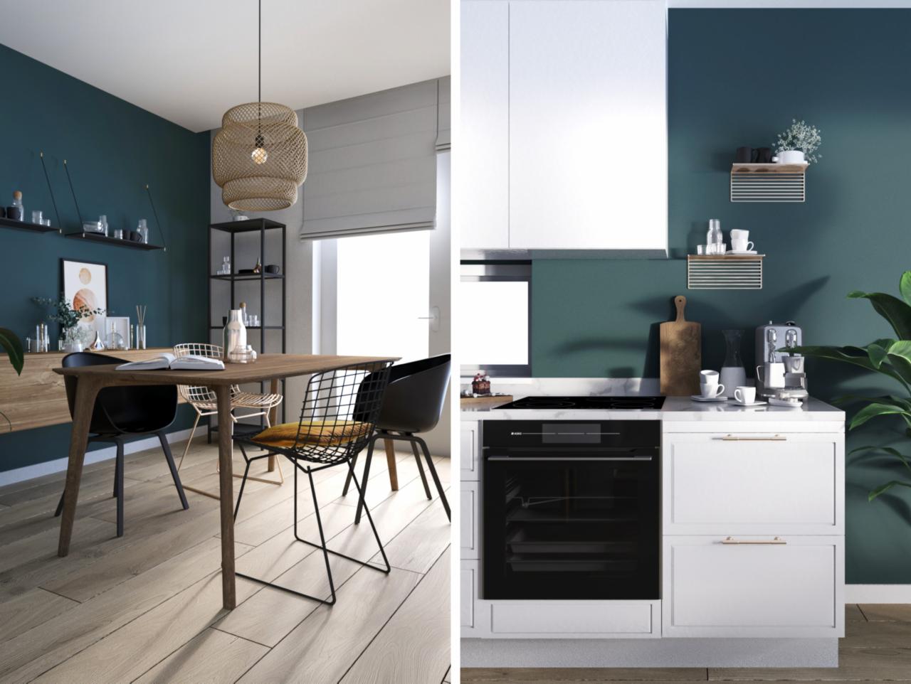 Jadalnia z drewnianym stołem i krzesłami w stylu skandynawskim, oraz fragment kuchni z białymi szafkami i sprzętami na tle ciemnozielonej ściany.