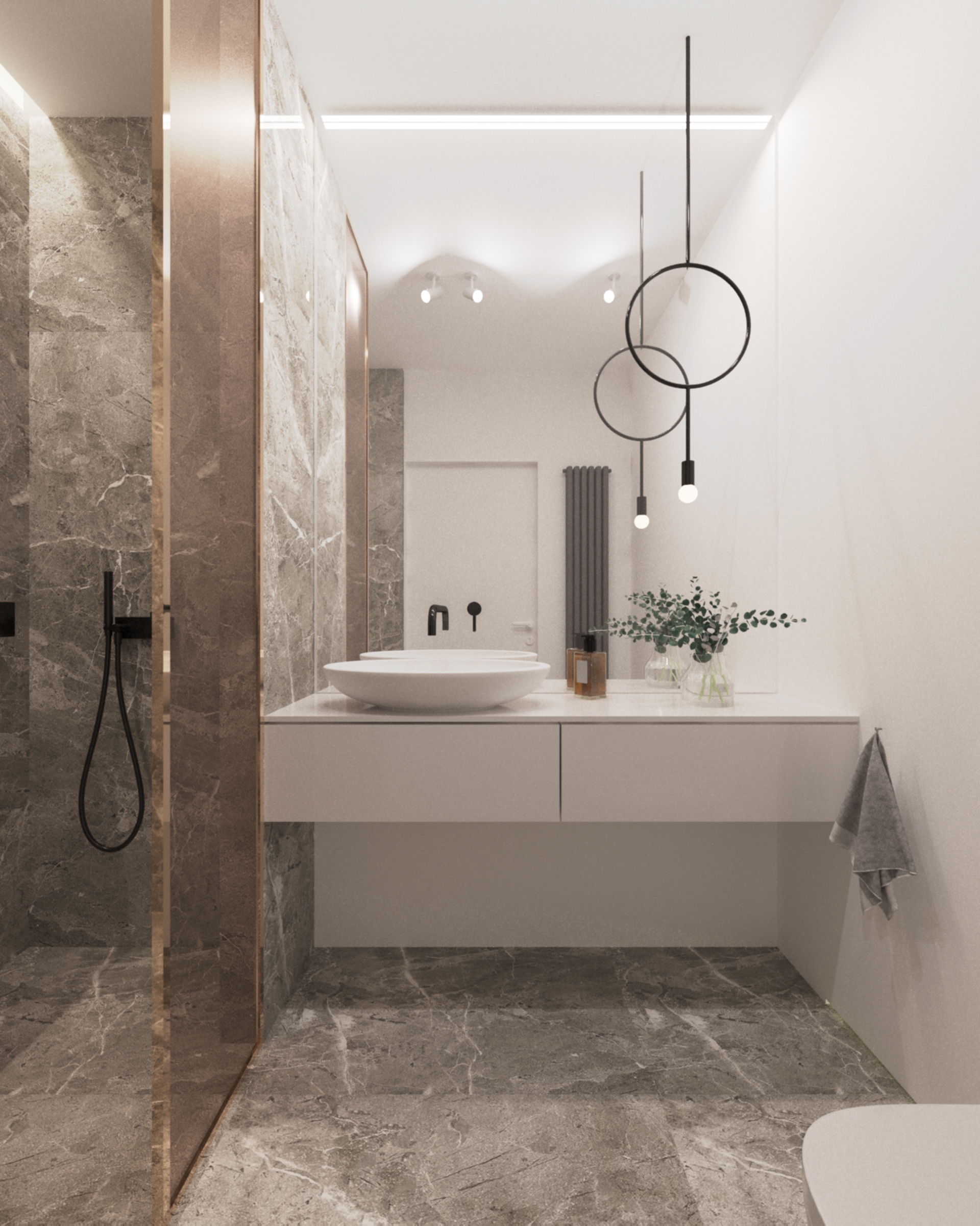 Minimalistyczna łazienka w odcieniach szarości z marmurowymi płytkami, okrągłą umywalką nablatową, wiszącą lampą z okręgów i szklaną kabiną prysznicową.