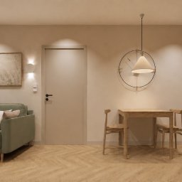 Dolecińska Projekt DARIA DOLECIŃSKA - Nowoczesne wnętrze z otwartym planem: salon z zieloną sofą, drewnianym stolikiem i okrągłym dywanem. Jadalnia z drewnianym stołem, krzesłami, lampą wiszącą i dużym zegarem ściennym. Na ścianie...