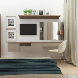 Nowoczesna sypialnia z beżowymi meblami na wymiar: szafka RTV pod telewizorem, toaletka z lustrem, drewniana półka z dekoracjami, minimalistyczne obrazy na ścianie i krzesło z metalowymi nogami.