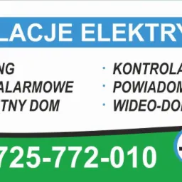 Baner reklamowy firmy z Bukowiny Tatrzańskiej oferującej instalacje elektryczne, systemy alarmowe, monitoring, kontrolę dostępu, wideodomofony i inteligentny dom, z wyraźnie widocznym numerem...
