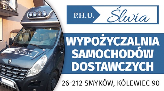 Szary samochód dostawczy marki Renault z napisem 'Śliwa' na masce i dodatkowymi światłami na dachu, obok reklama firmy P.H.U. Śliwa - Wypożyczalnia Samochodów Dostawczych, 26-212 Smyków, Kółowiec 90.