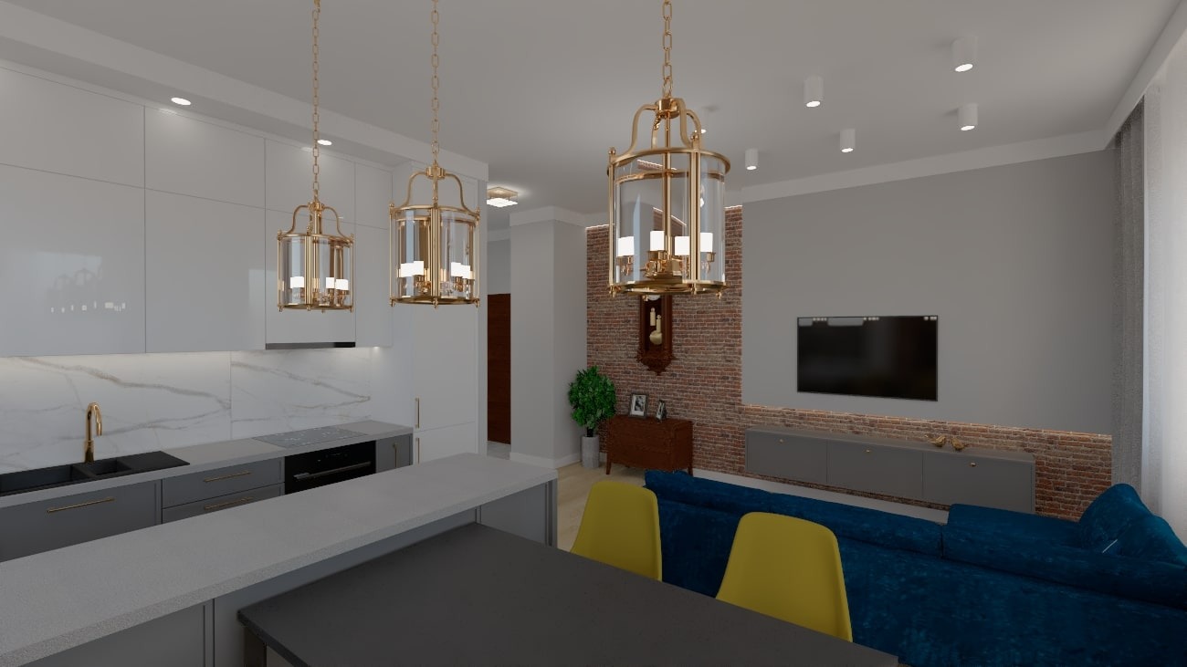 Wnętrze otwartej przestrzeni z kuchnią z białymi szafkami i marmurowym backsplash, szarym blatem oraz złotymi detalami, takimi jak bateria i wiszące lampy w stylu latarni, połączonej z salonem...
