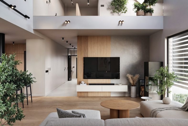 Nowoczesny salon z drewnianymi akcentami: lamele na ścianie za telewizorem, drewniana podłoga, rośliny doniczkowe na antresoli. Minimalistyczny design, neutralna kolorystyka.