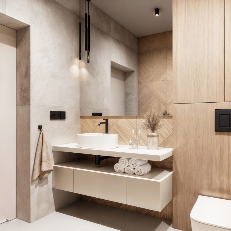 Minimalistyczna łazienka: okrągła umywalka, drewniane panele, czarne lampy wiszące. Nowoczesny design z dbałością o detale i stonowaną kolorystykę.