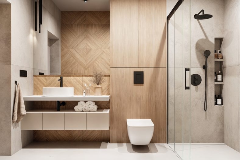 Nowoczesna łazienka z drewnianymi akcentami: geometryczny wzór na ścianie, biała umywalka nablatowa, kabina prysznicowa z czarnymi detalami i minimalistyczna toaleta.