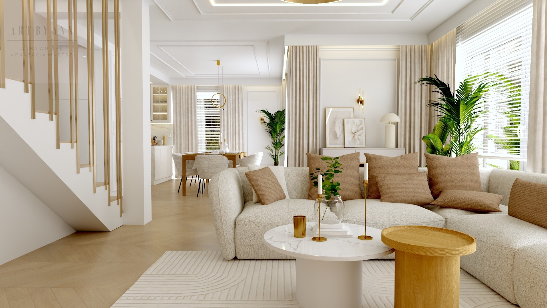 Jasne wnętrze z sofą, stolikiem i schodami z dekoracyjną, złotą balustradą. Widok na jadalnię i kuchnię. Stonowana kolorystyka i naturalne światło.