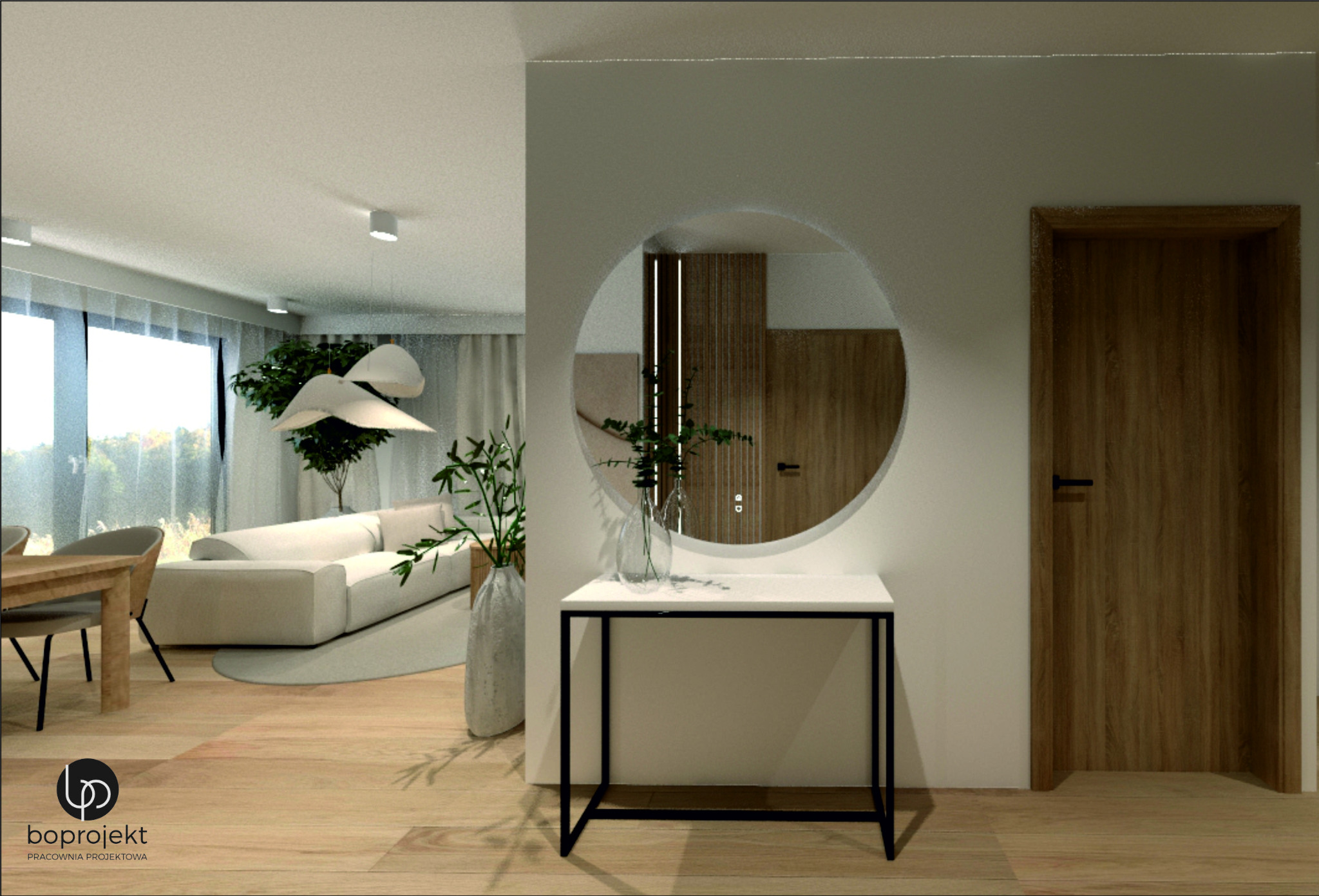 Nowoczesny przedpokój z okrągłym lustrem, konsolą z czarnymi nogami i białym blatem, oraz drewnianą podłogą i drzwiami. W tle widoczny salon z sofą i roślinami.
