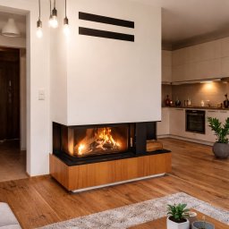 JUST HOME KOMINKI PROJEKTY JUSTYNA WIECZOREK - Heatro, duzÿ wklad kominkowy narozny. Obudowa kominka z dewnem