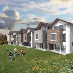 Wizualizacja szeregu nowoczesnych domów z drewnianymi elementami elewacji, usytuowanych na wzgórzu z kwitnącą łąką; w oddali widoczne zabudowania miejskie, a na pierwszym planie bawiące się dzieci.