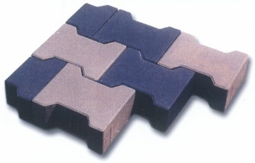 Ułożone obok siebie kostki brukowe typu 'kość' w kolorach szarym i grafitowym, tworzące wzór zygzaka.