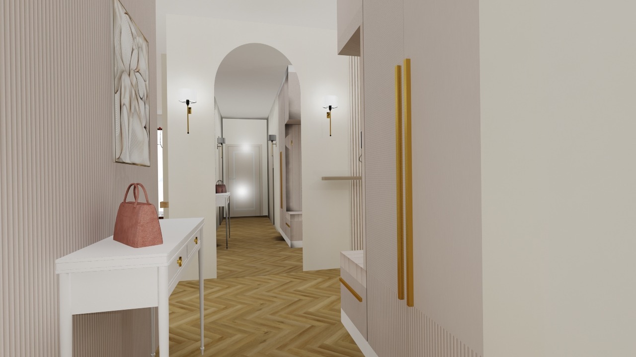 Wnętrze przedpokoju w pudrowych odcieniach z elementami złota. Widoczna konsola z torebką, dekoracja ścienna i szafa w zabudowie. Podłoga w jodełkę.
