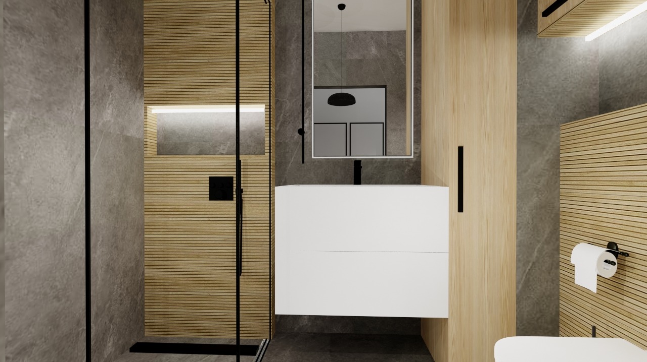 Minimalistyczna łazienka z drewnianymi panelami, szarą płytką i białą szafką pod umywalką. Kabina prysznicowa z czarnymi detalami. Nowoczesny design.
